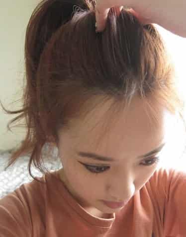 时尚蓬松丸子头绝对是无数爱美女生们最爱的一